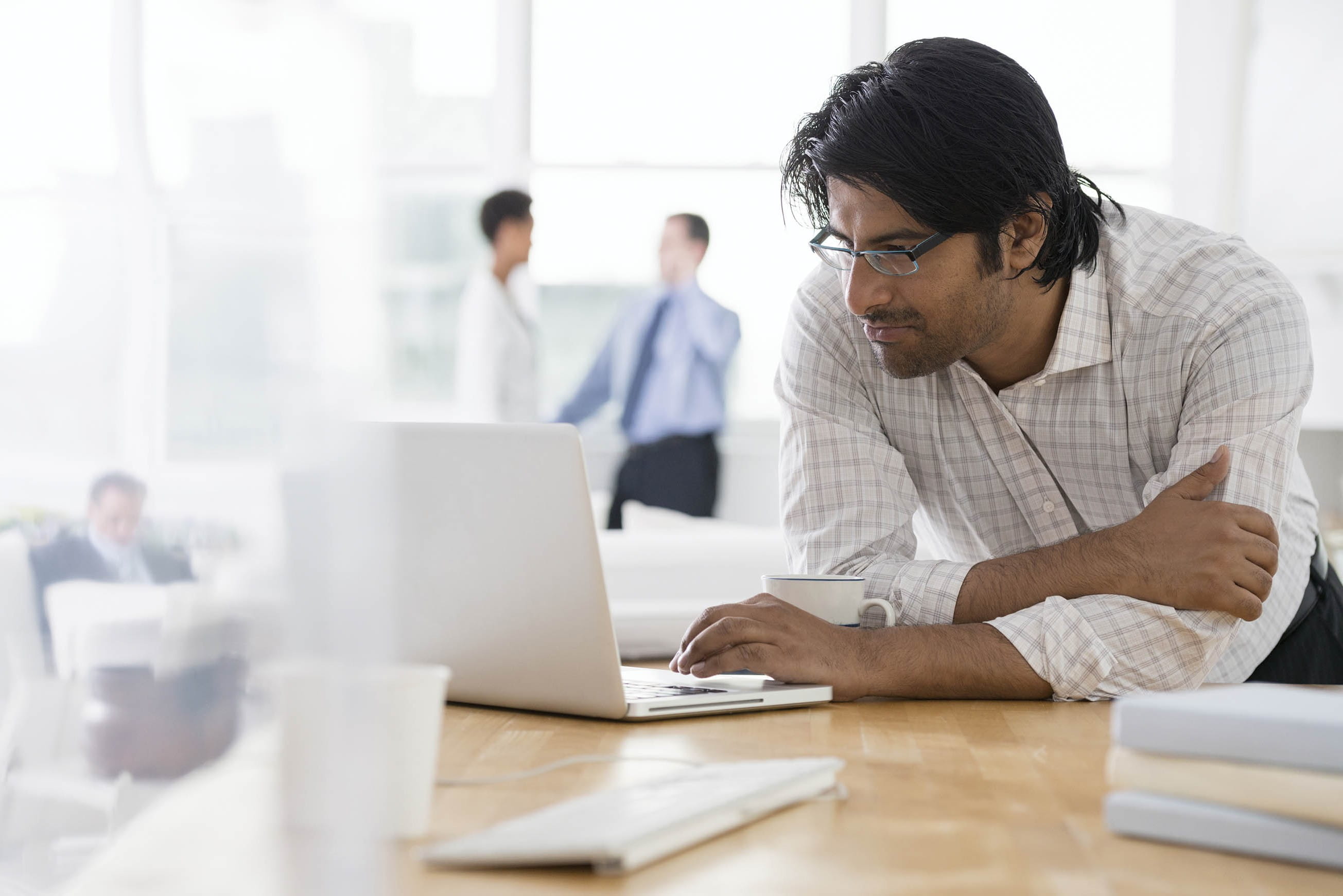 Man looking at laptop