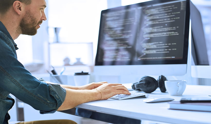 Man works at computer