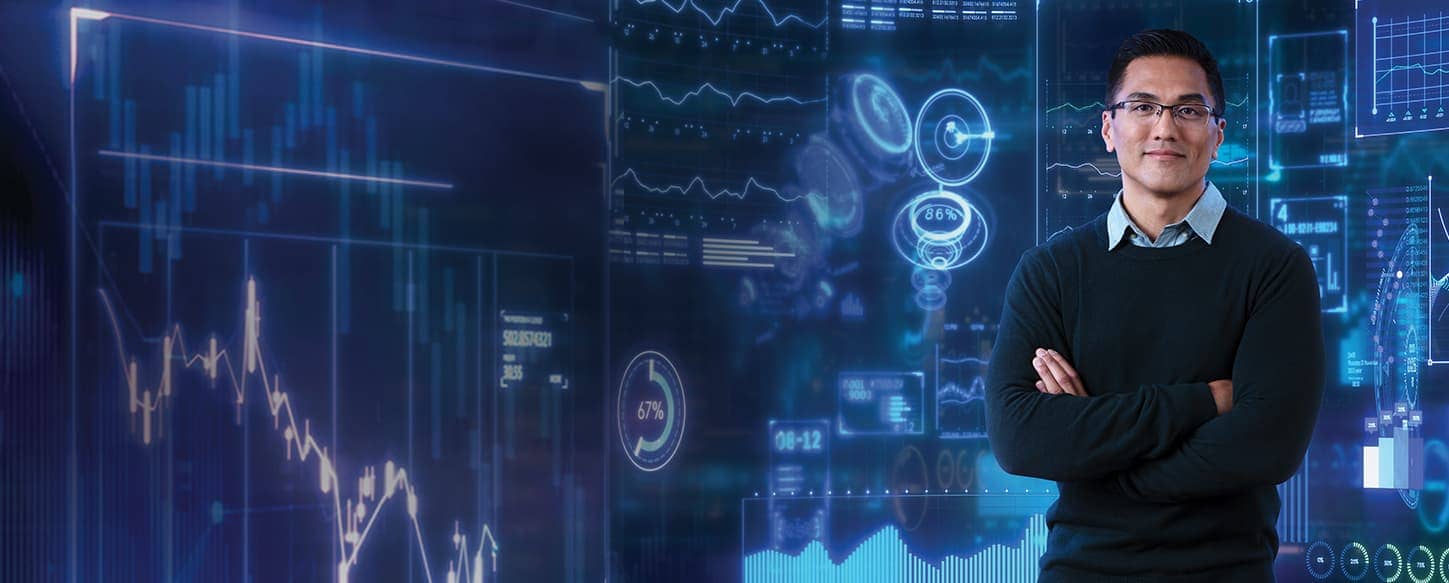 Man standing in front of projected digital screen