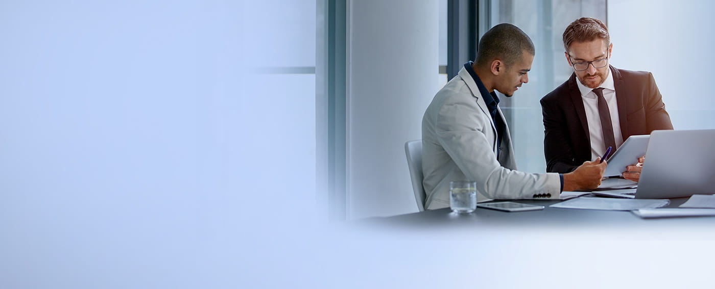 Two workers at desk