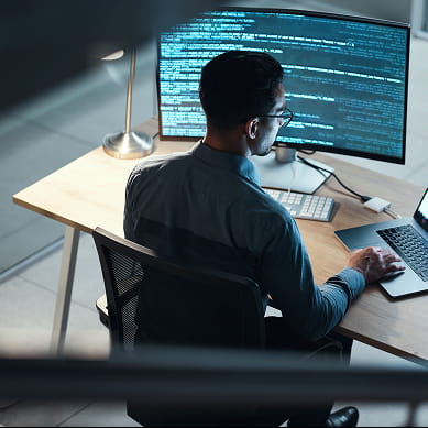 man working at computer