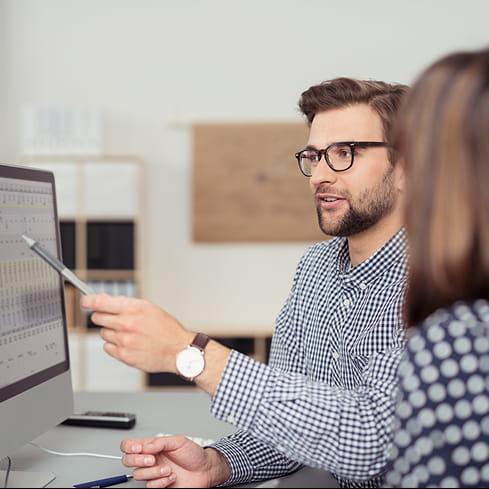 two people at computer